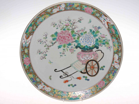 Japanese Meiji Period polychrome charger, painted with cart and jardiniere...
