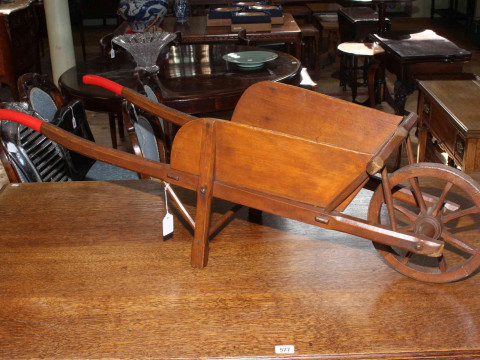 Vintage wooden child's/apprentice garden wheelbarrow, overall length 42cm.
