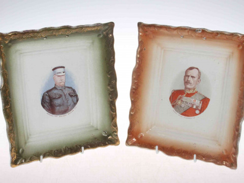 Two Sunderland pottery styled military figure plaques with gilded 'frame'...