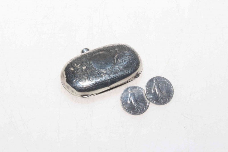 Silver sovereign case and double coin brooch.