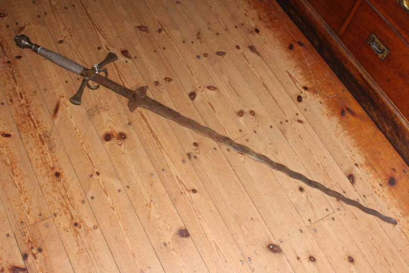 19th Century brass mounted wavy bladed sword.