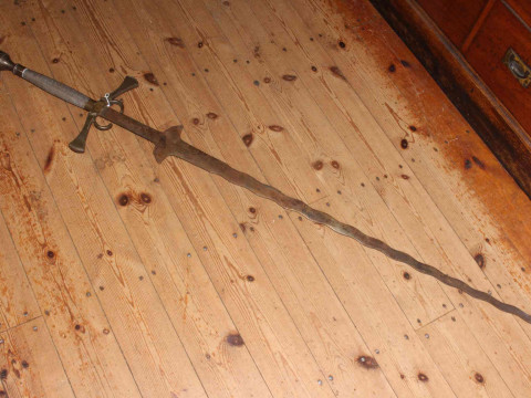 19th Century brass mounted wavy bladed sword.