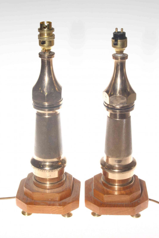 Pair brass hose nozzle table lamps, made from old nozzles stamped NCB, on oak plinths, 35.5cm excluding fittings.