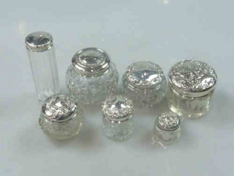 Seven Silver Topped Dressing Table Jars