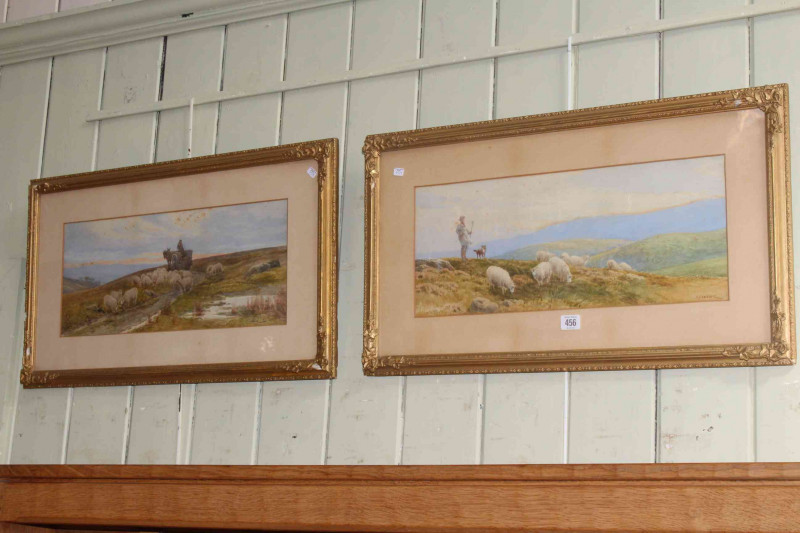 C. Goddard, Shepherds and Sheep on Moorland, pair watercolours, both signed lower right, 21cm by 52cm, in glazed gilt frames.