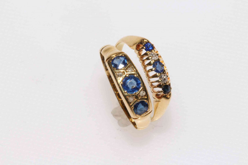 Two 18 carat gold sapphire and diamond rings, box.