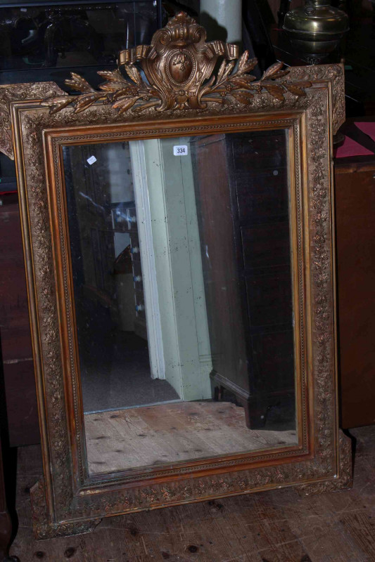 Victorian ornate gilt framed overmantel mirror, 127cm by 84.5cm overall.