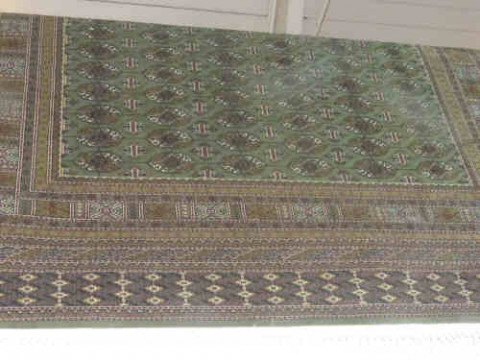 Green ground Bokhara Rug, 2.30m x 1.50m