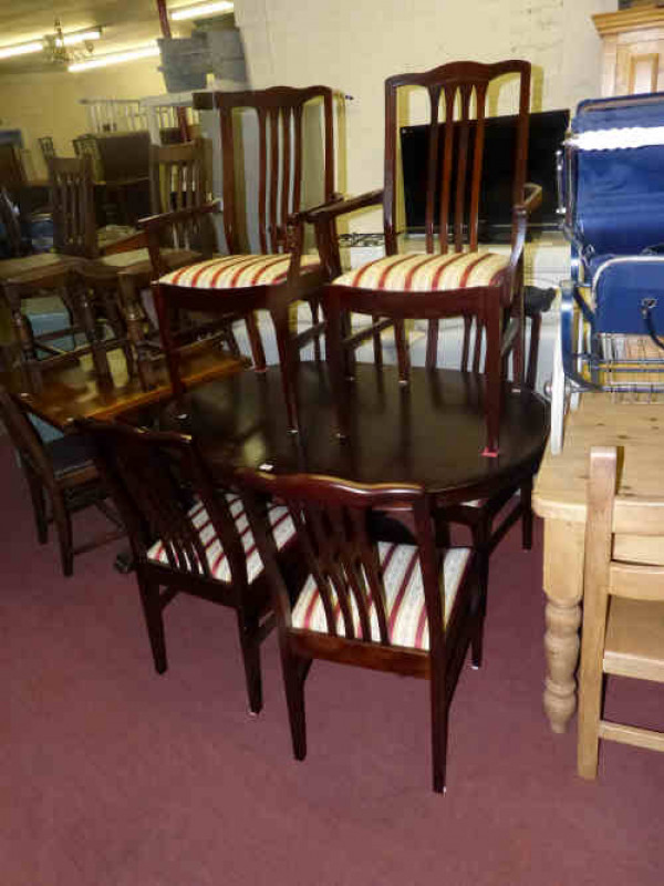 Stag Minstrel Eight-piece Dining Room Suite and matching slim glazed illuminated Display Cabinet