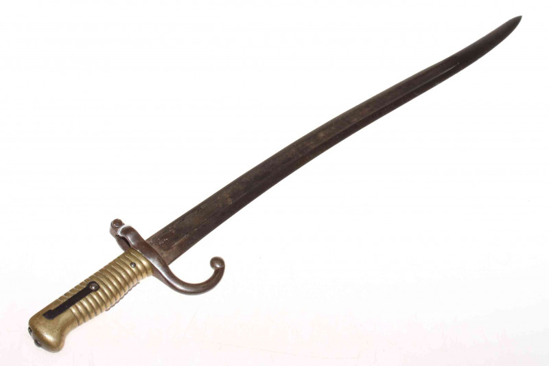 A 19th Century French Chassepot rifle bayonet of typical style, blade stamped and engraved 1869, 70cm.
