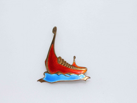 Silver and enamel galleon brooch.