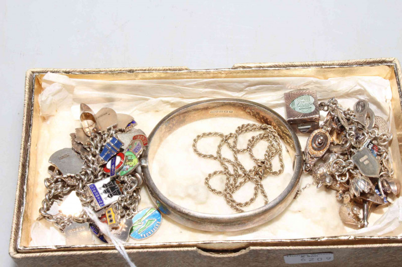 Box with two silver charm bracelets, engraved bangle and rope twist necklace (4)