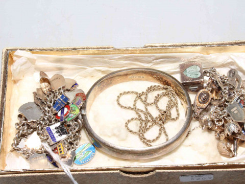Box with two silver charm bracelets, engraved bangle and rope twist necklace...