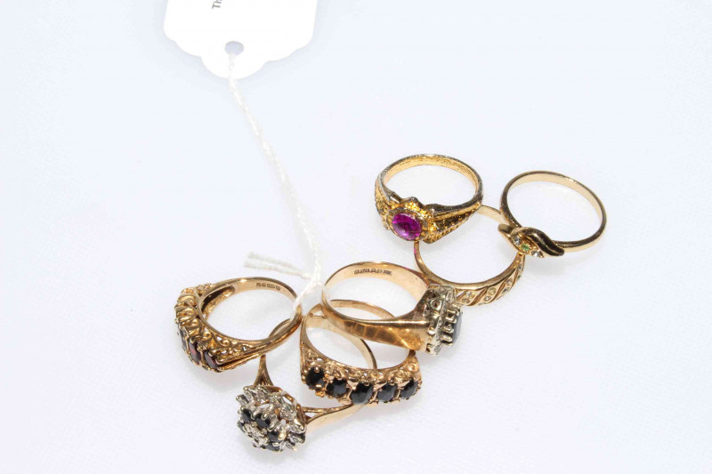 Four 9 carat gold gem set rings and three others (7).