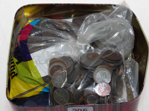 Tin with coins and medals.