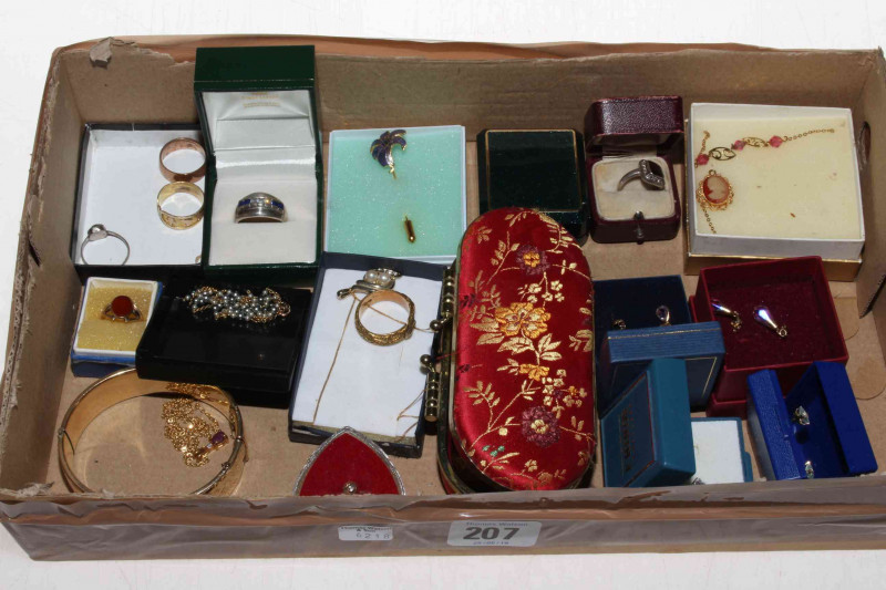 Box with jewellery including gold ring.