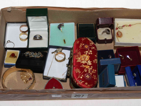 Box with jewellery including gold ring.