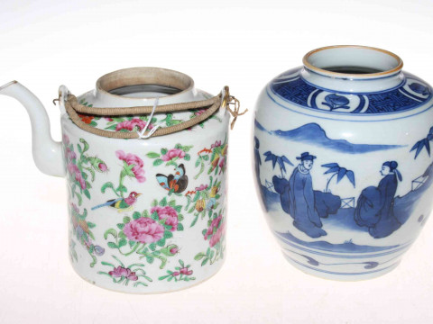Blue and white Chinese vase and a Chinese teapot decorated with bid and...