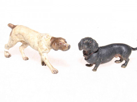 Two early 20th Century cold painted bronze dogs, pointer and dachshund,...