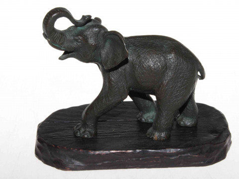 A Japanese Meiji period well detailed bronze elephant with raised trunk,...