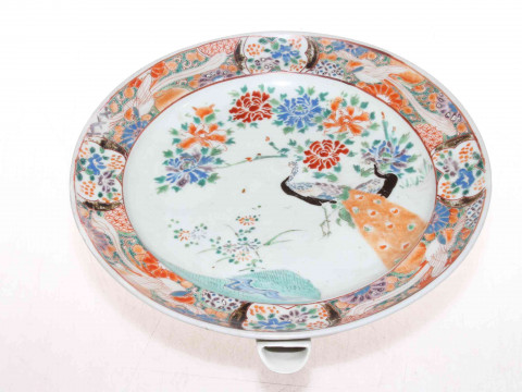 Chinese warming plate depicting a peahen, 25cm.