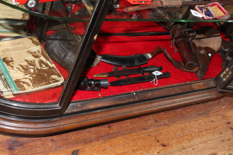 Militaire collection comprising bayonet, forces dagger, two leather pistol holsters, flask holder, spats, rifle sight and WWII Ministry of Information magazines