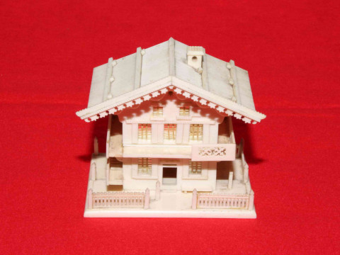 Chinese ivory 'Home', the hinged roof opening to form a ring box, 8cm
