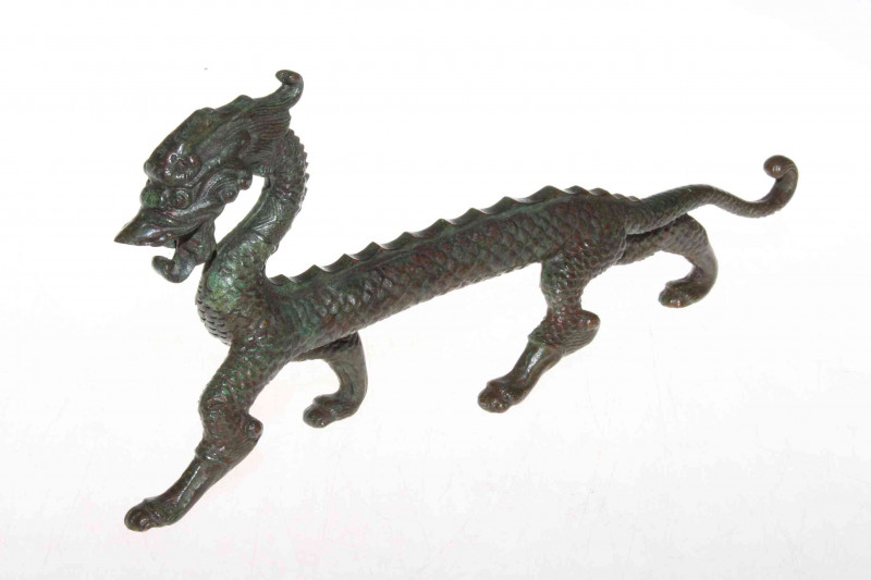Oriental cast elongated dragon ornament, 32cm