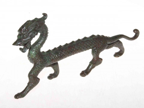 Oriental cast elongated dragon ornament, 32cm