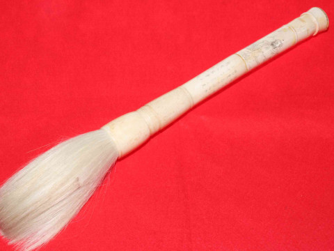 Chinese ivory/bone handled fly whisk, having engraved figure and calligraphy,...