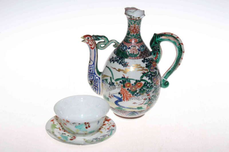 Chinese polychrome tea bowl and saucer and a ewer (2)