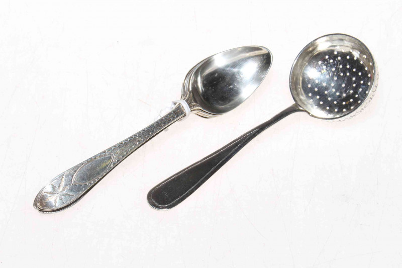 Five Irish silver bright-cut teaspoons, Dublin 1911 and Russian silver sifting spoon dated 1887